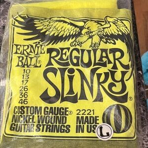 Ernie Ball guitar strings-t-shirt. Original packaging